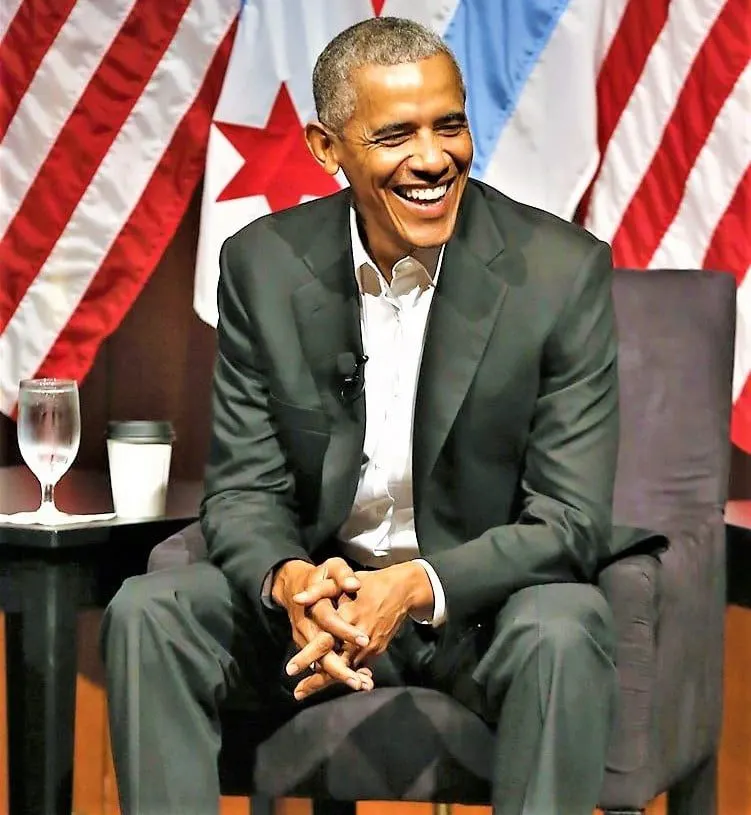 Barack Obama in the Public state of china alone smiling on the Stage 