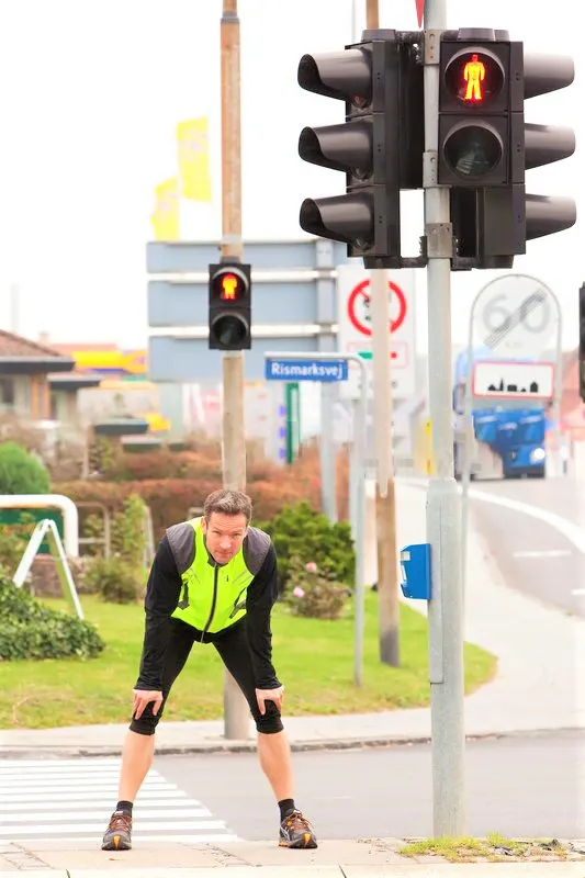 Even a Soprts man, waiting for walk away from the Zebra Crossing