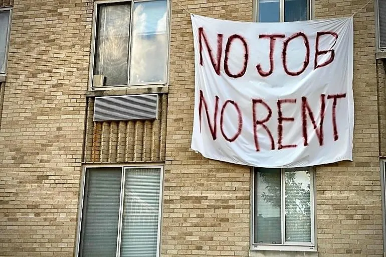 No job No Rent, a banner hanging on the building due to not any job in America