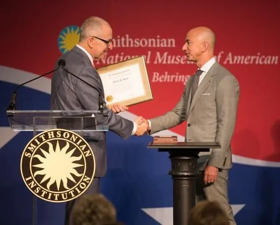 smithsonian institution getting certificate from speaker
