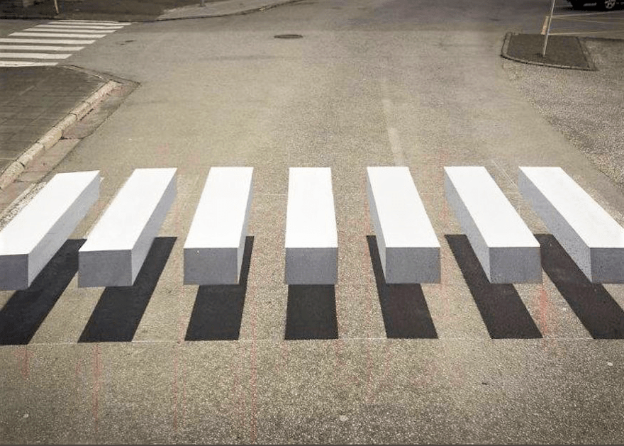 sometimes the optical illusions for the safety measurements on the road and at the streets