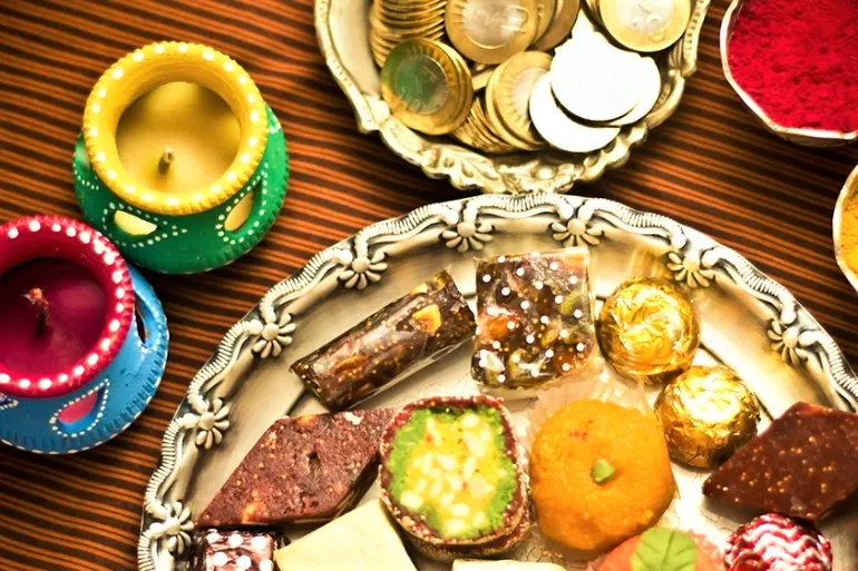 To mark Diwali, people wear new clothes, visit friends and family, and exchange sweets and gifts
