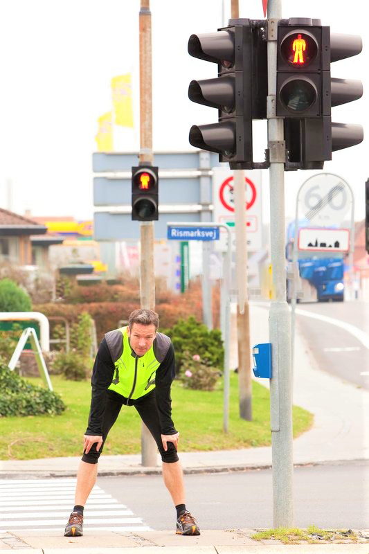 Even a Soprts man, waiting for walk away from the Zebra Crossing